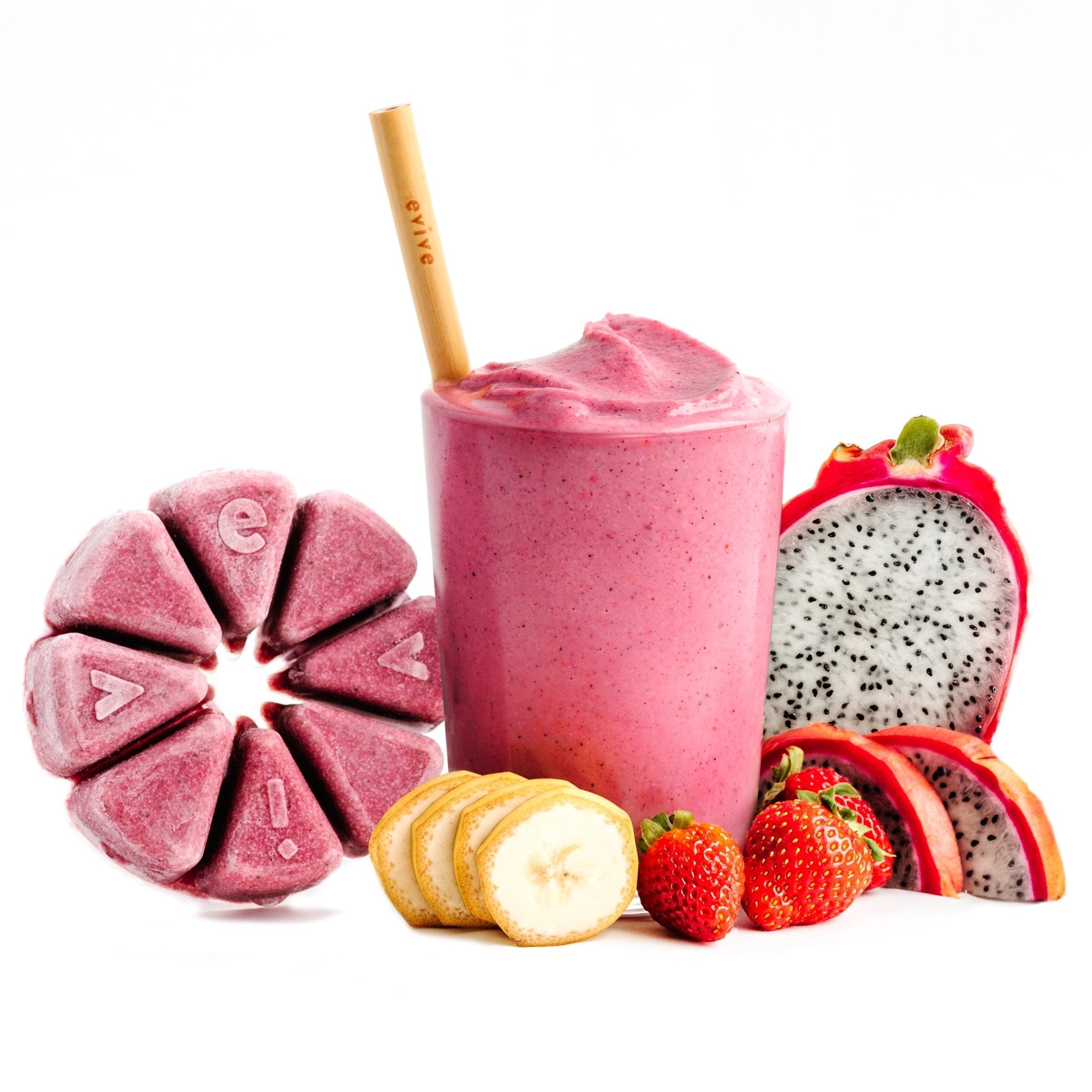 Pink smoothie with fruit slices and a circular, segmented frozen berry pack.
