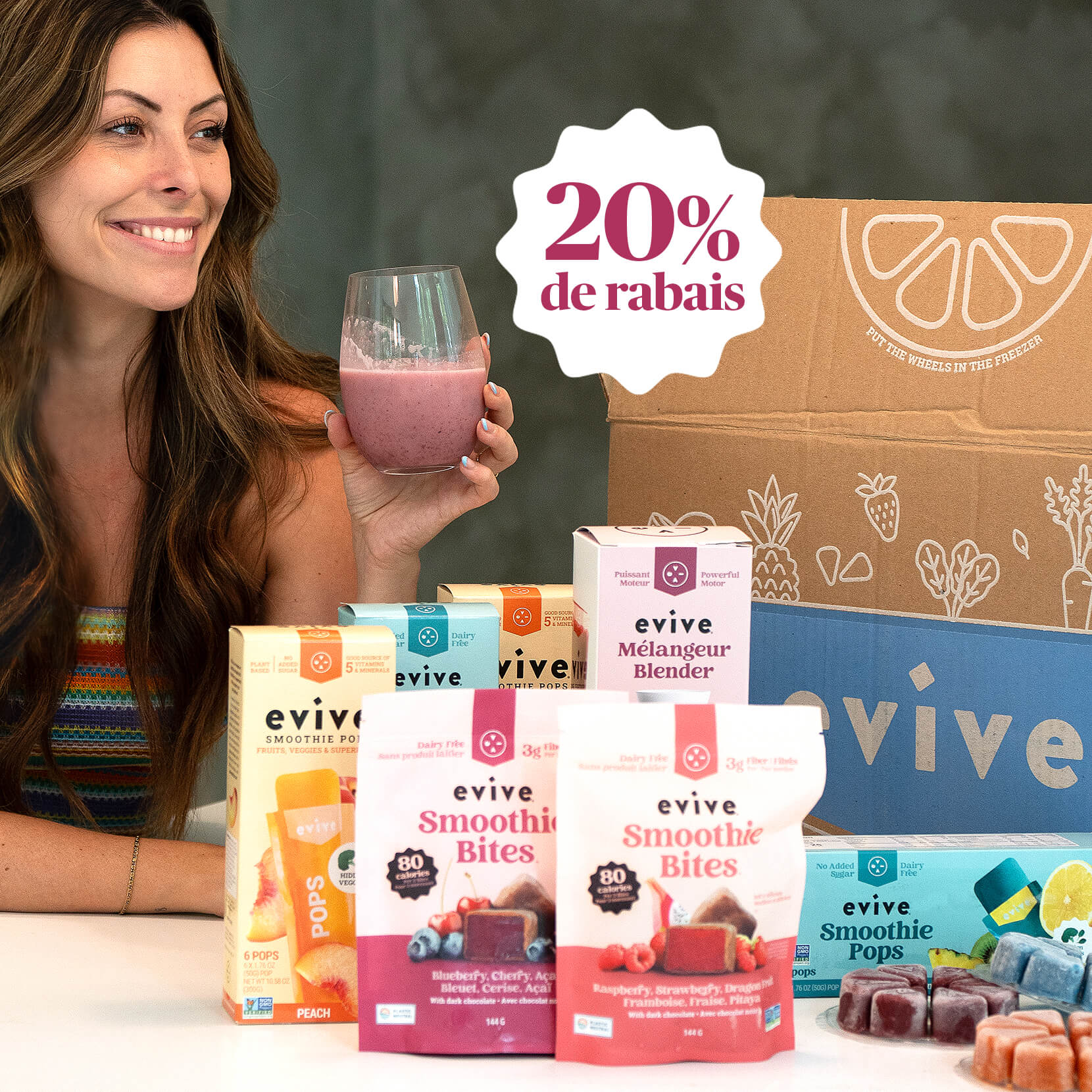 Woman holding smoothie with Evive products and 20% discount sign.