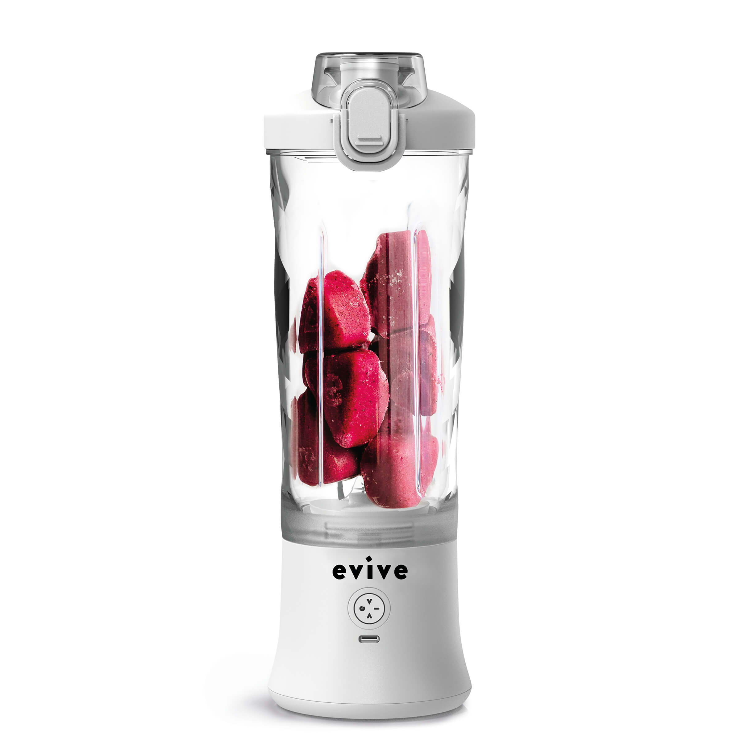 White blender with red frozen fruit inside.
