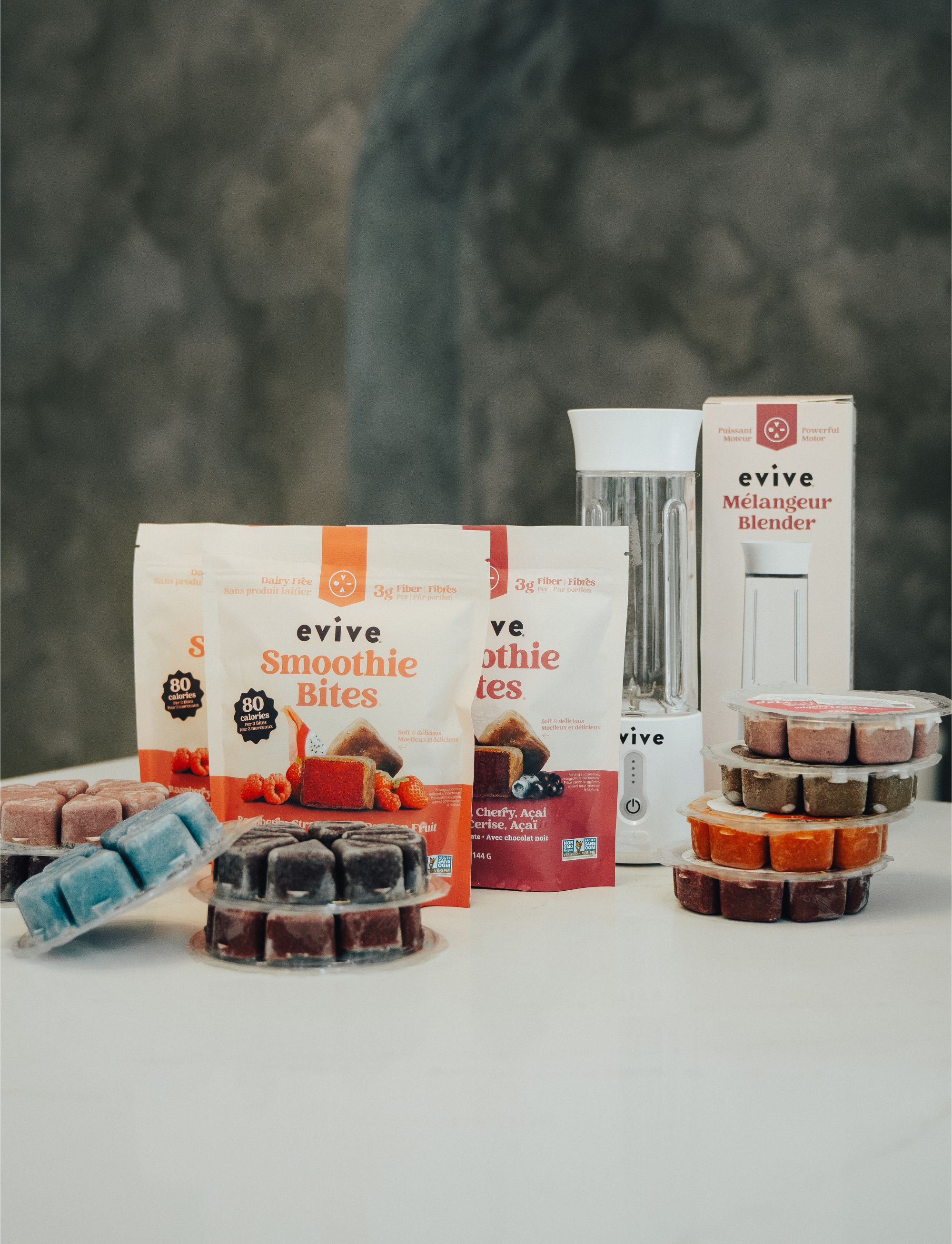 Evive Smoothie Bites and blender on a table.