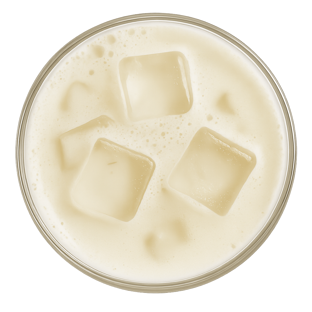 A glass of iced purple milk tea with large ice cubes.