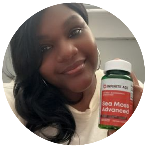 Person holding a bottle labeled 'Sea Moss Advanced' by Infinite Age.