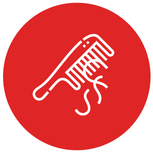 White comb icon with hair on a red circle background.