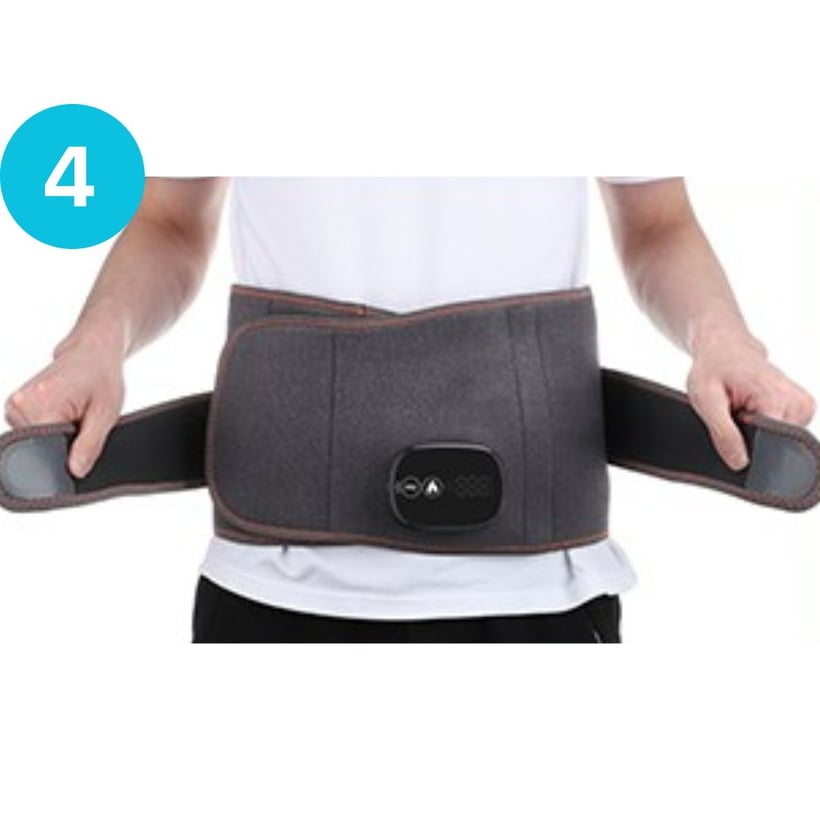 Person wearing a gray back support belt with a control panel.