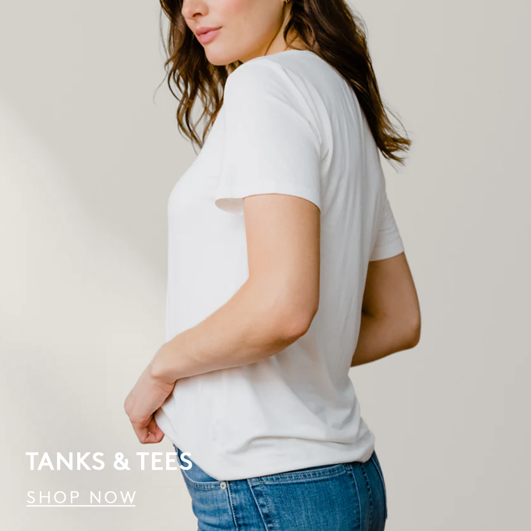 Side view of a woman wearing a white t-shirt, text reads tanks & tees, shop now