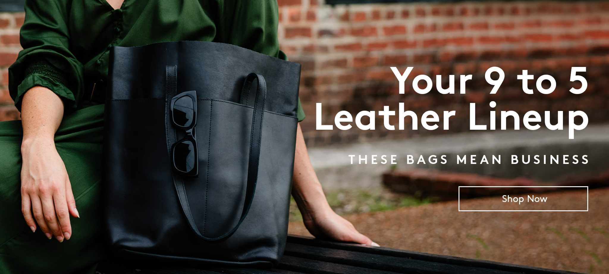 Black leather tote on bench beside woman, text reads your 9 to 5 leather lineup, these bag mean business, shop now