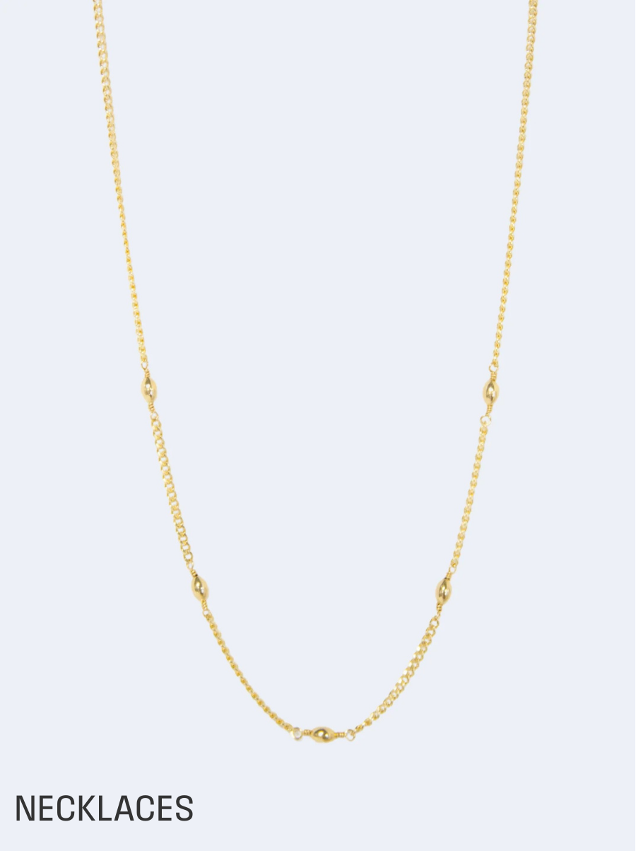 gold necklace with beads. shop necklaces.