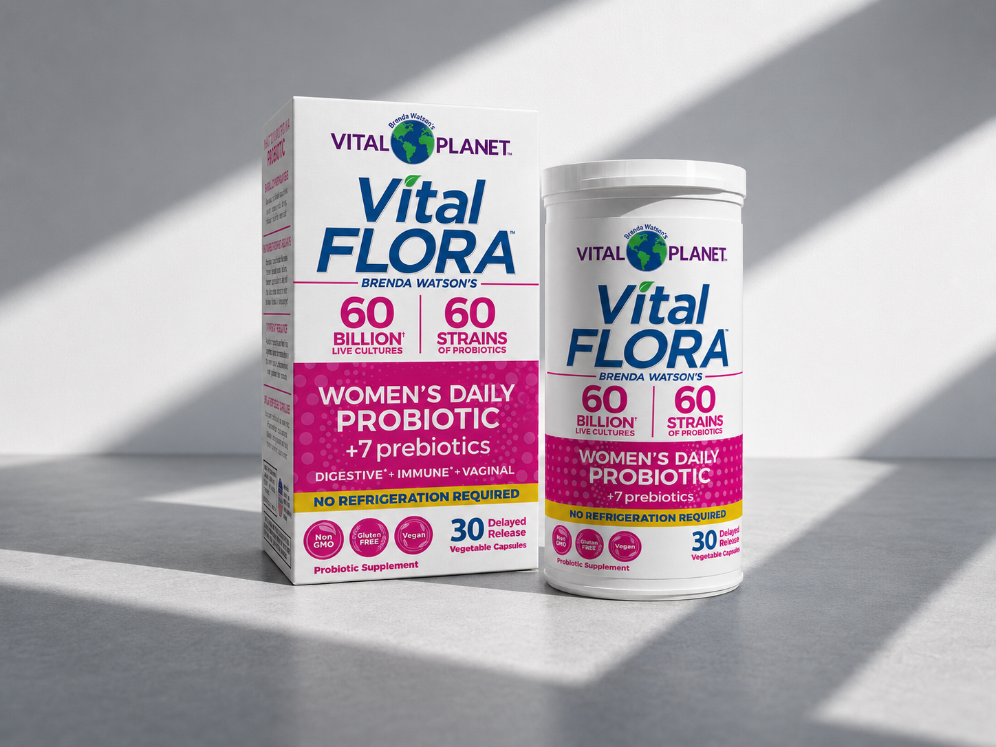 A box and bottle of Vital Planet Vital Flora Women's Daily Probiotic supplement on a plain surface.