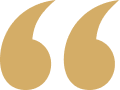 A graphic of tan double quotation marks.