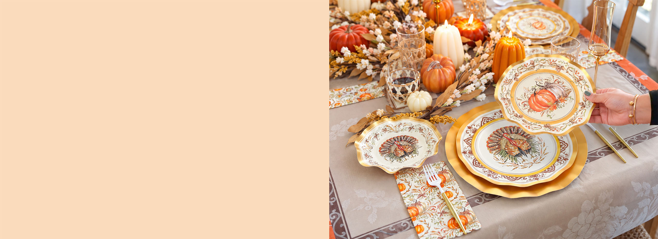 A person sets a Thanksgiving-themed table with decorative plates featuring turkeys and pumpkins, surrounded by autumn decor.
