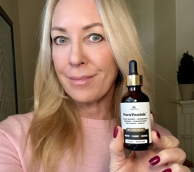 Lucy Fenton holding Cleantra product