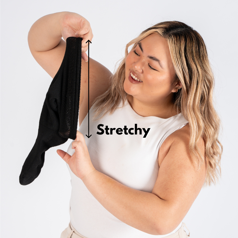 Person stretching a black fabric with 'Stretchy' text and arrows.