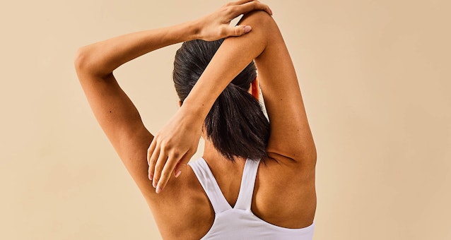 woman stretching arms