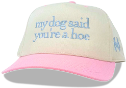 A beige and pink cap with blue embroidered text.