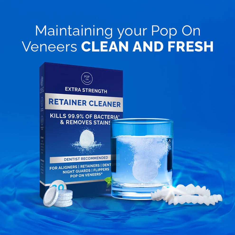 Box of retainer cleaner tablets next to a glass with dissolving tablet.