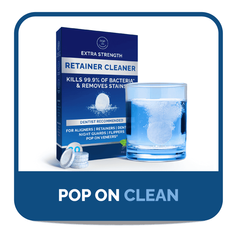 Box of retainer cleaner tablets next to a glass with dissolving tablet.