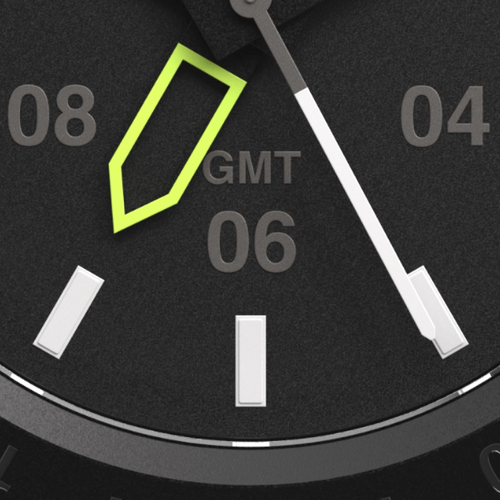 Close-up of a watch face showing GMT 06 with a yellow hand.