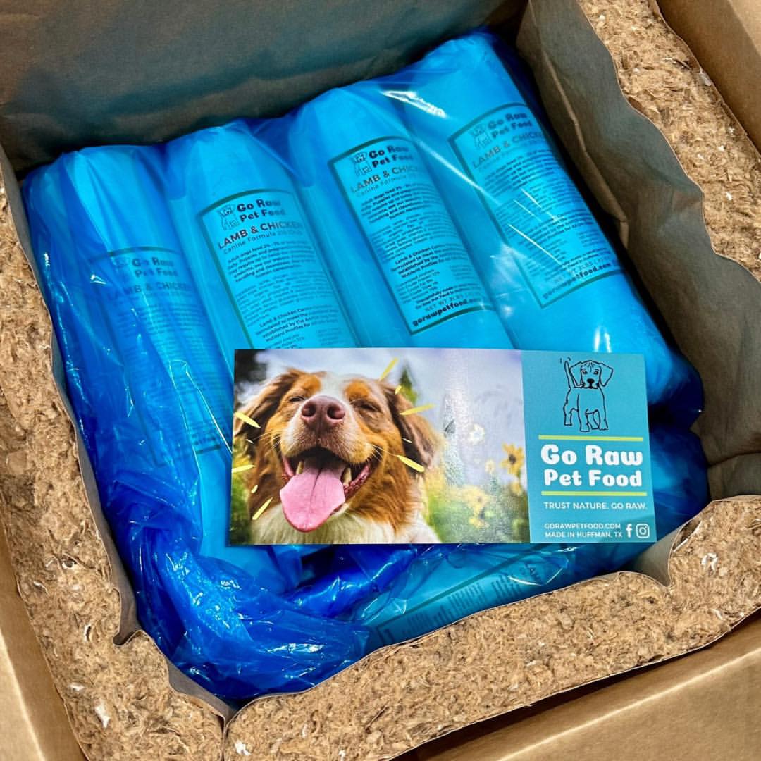 Box of Go Raw Pet Food with a happy dog image.
