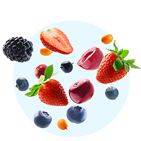 Assorted berries and small fruit floating on a light background.