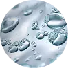 Close-up of various sized bubbles on a white background.