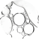 Close-up of various sized bubbles on a white background.