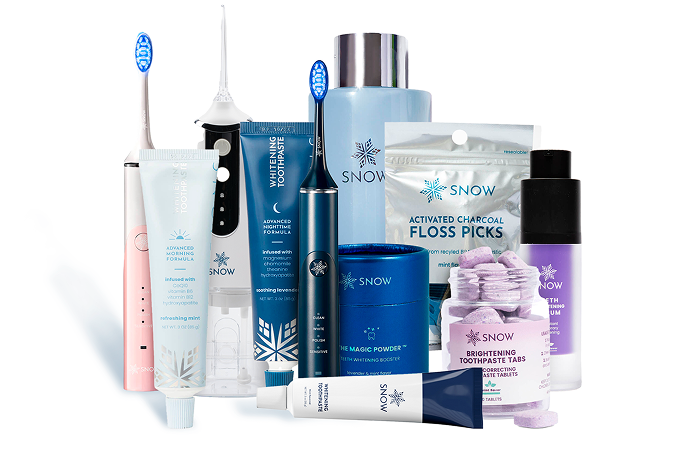 Assorted dental care products including toothbrushes, toothpaste, floss picks, and mouthwash.