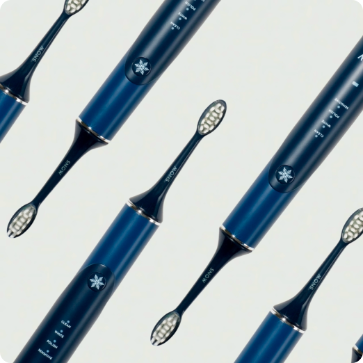 Pattern of blue electric toothbrushes on a light background.