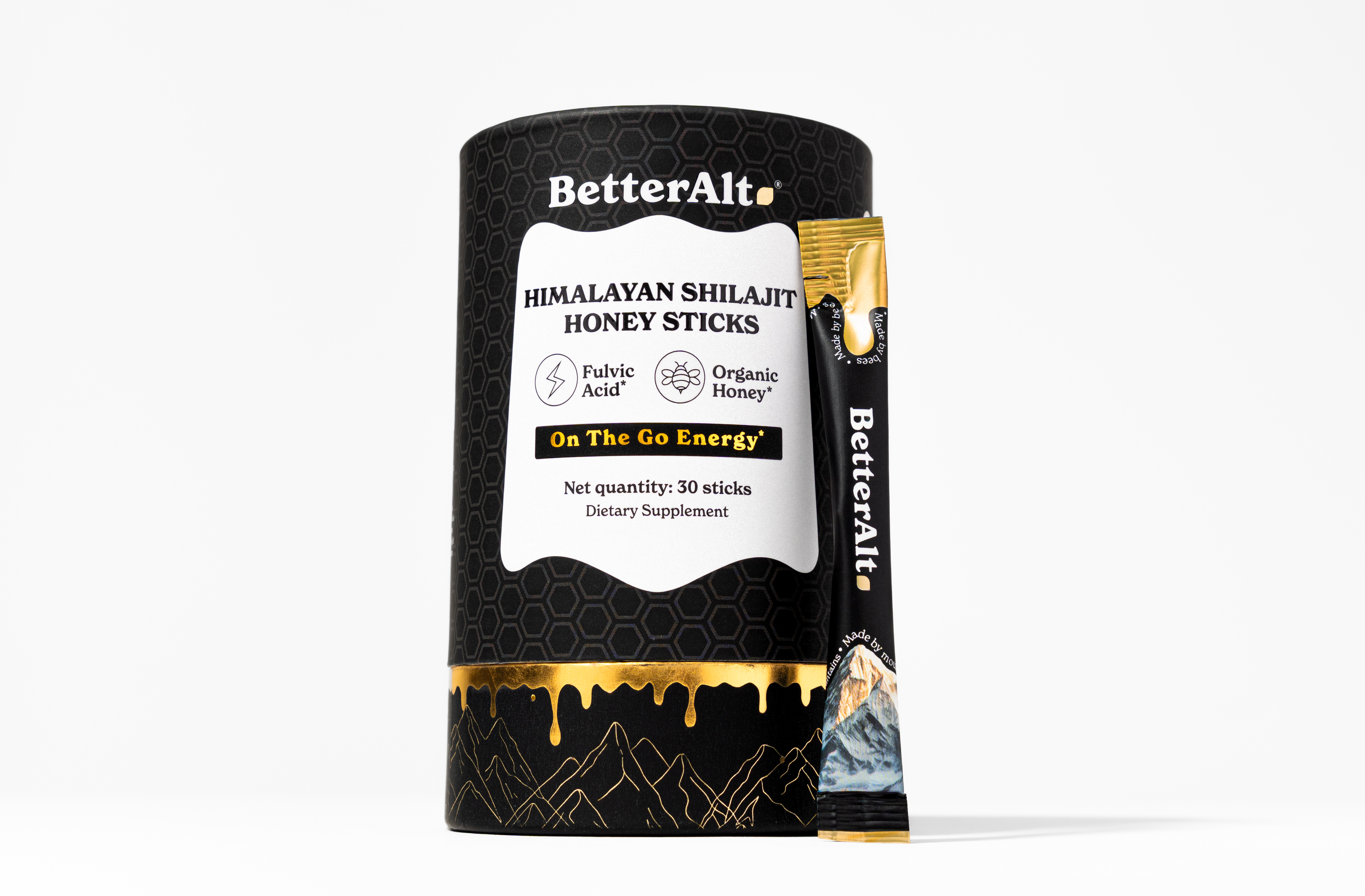 Black container of Himalayan Shilajit Honey Sticks with a single stick beside it.