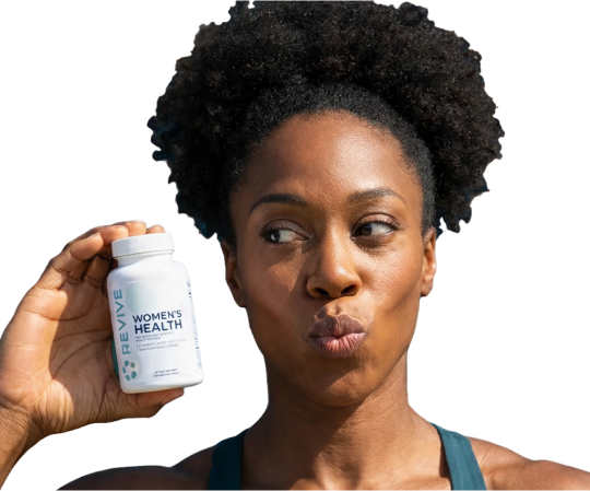 A smiling, athletic woman holds up two white bottles of Revive Cortisol Support supplements.