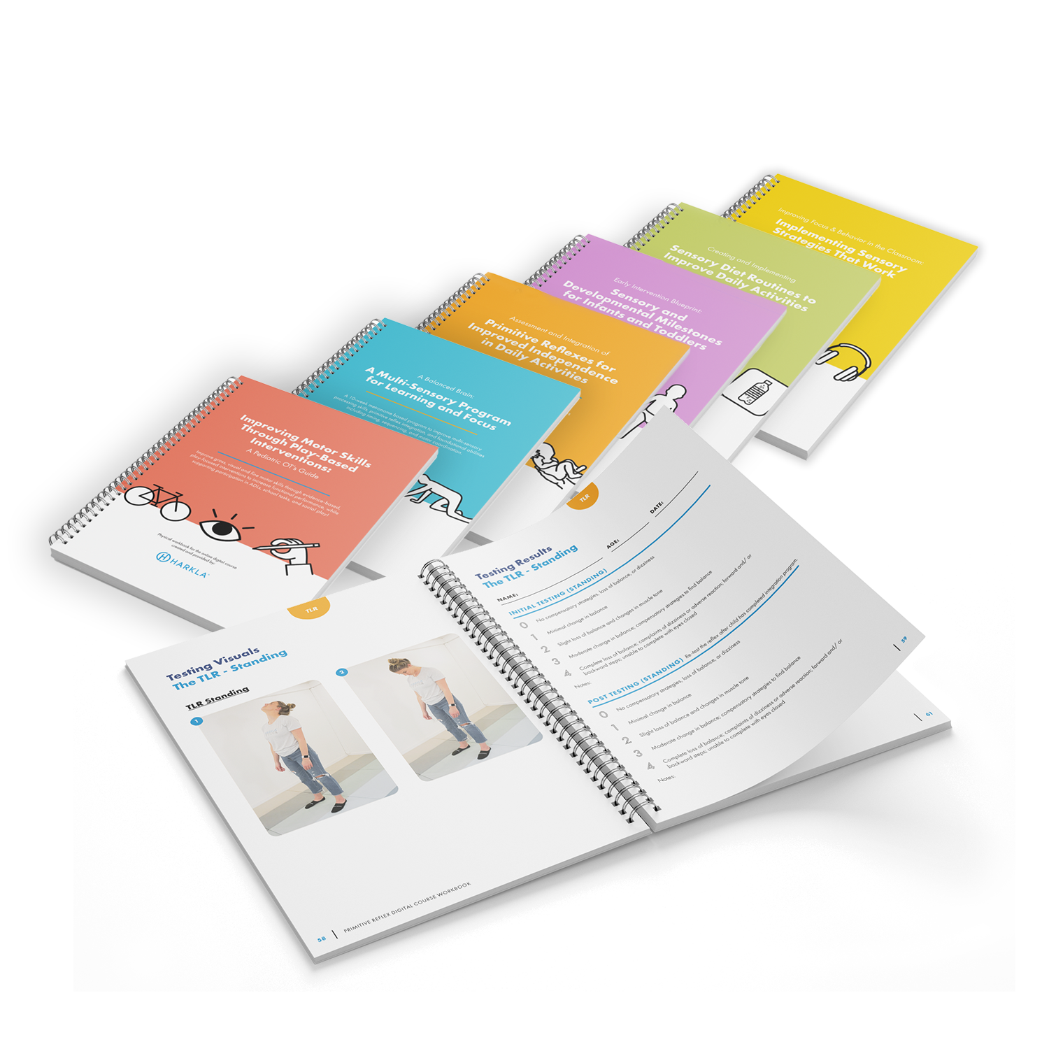 A collection of colorful, spiral-bound workbooks and guides laid out on a white surface, with one open.