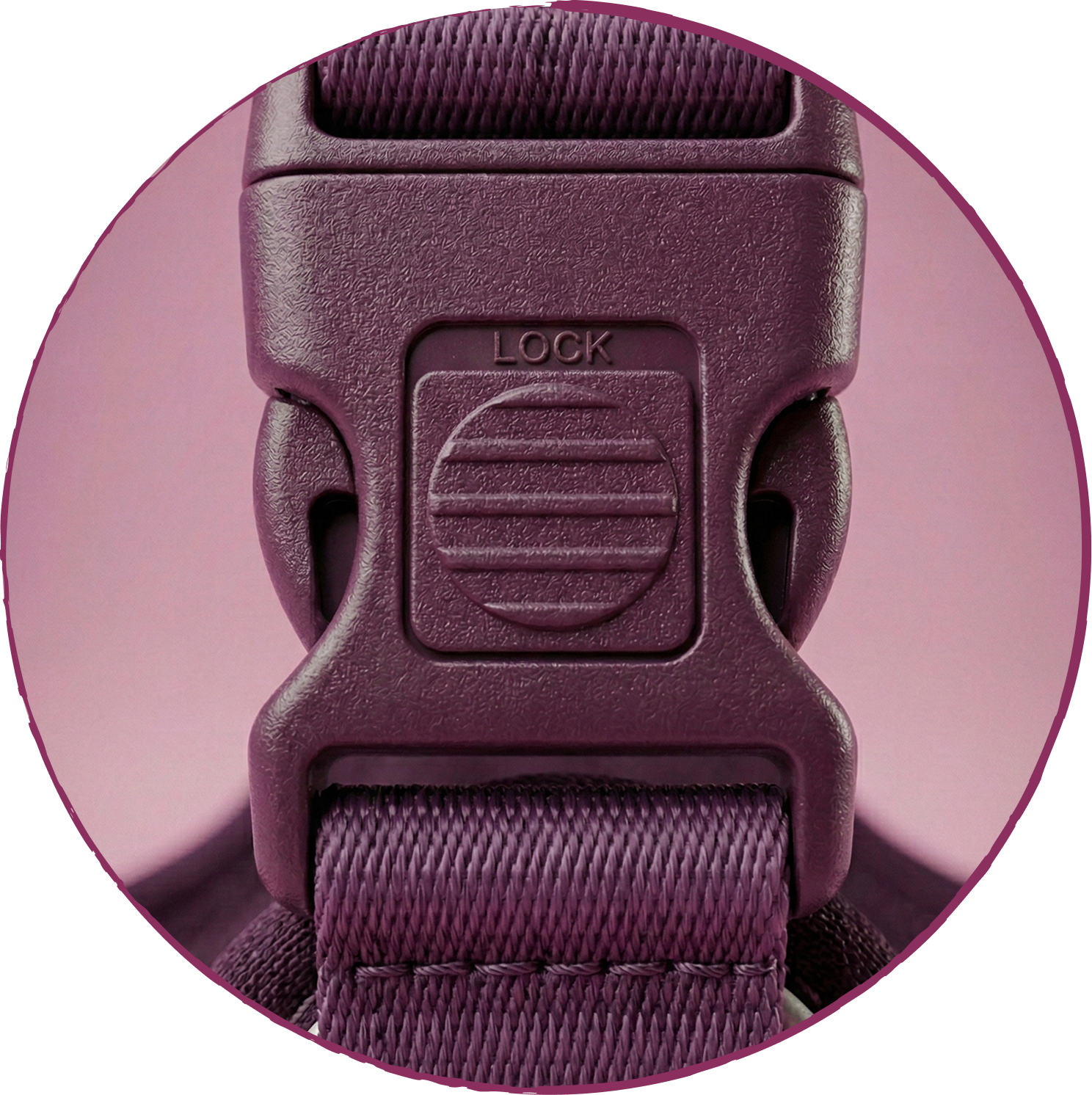 A close-up of a purple plastic buckle with the word 'LOCK' embossed on it, on a purple strap.