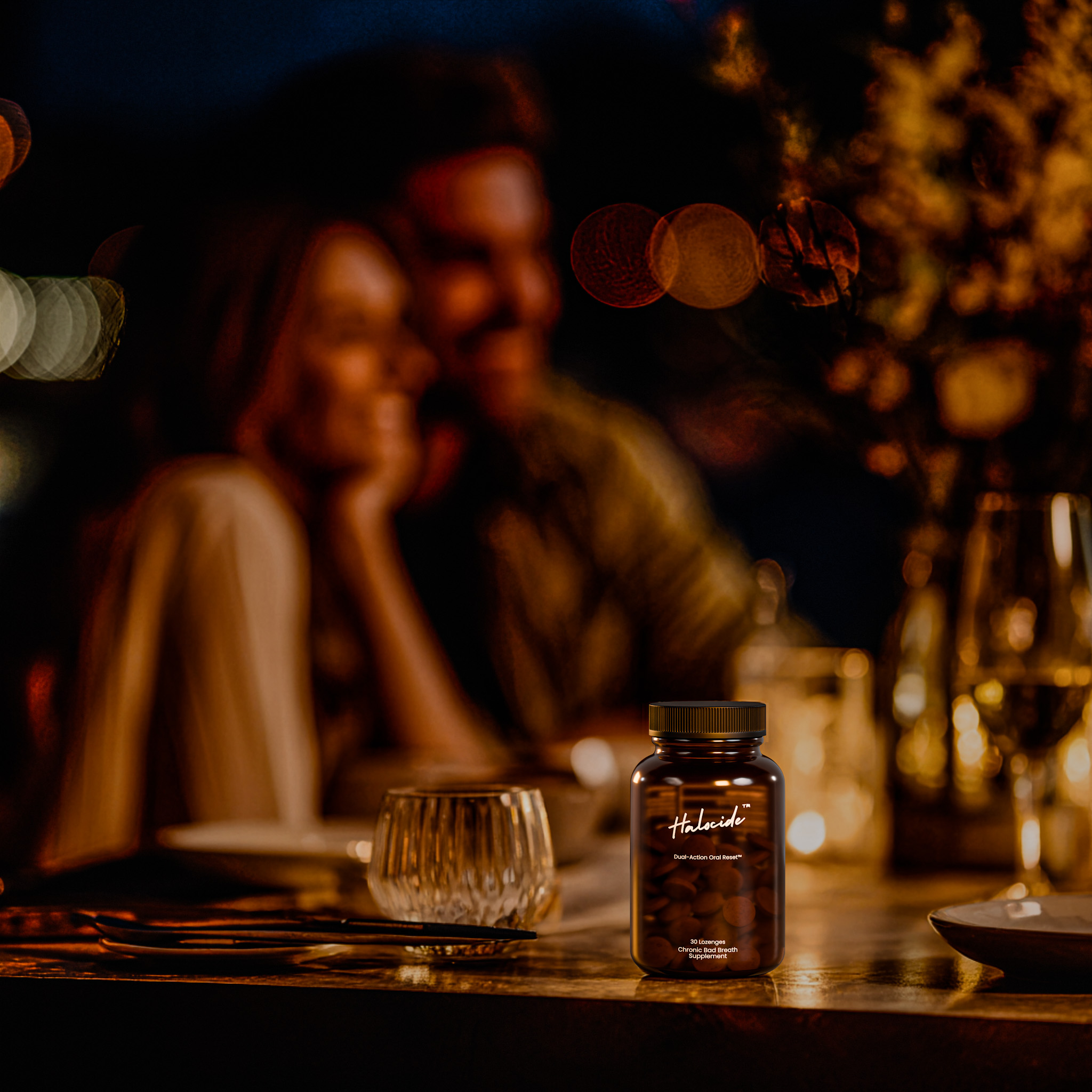 Blurry couple in a dimly lit setting with a focus on a labeled bottle on the table.