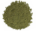 A circular pile of fine, green powder on a white background, viewed from directly above.