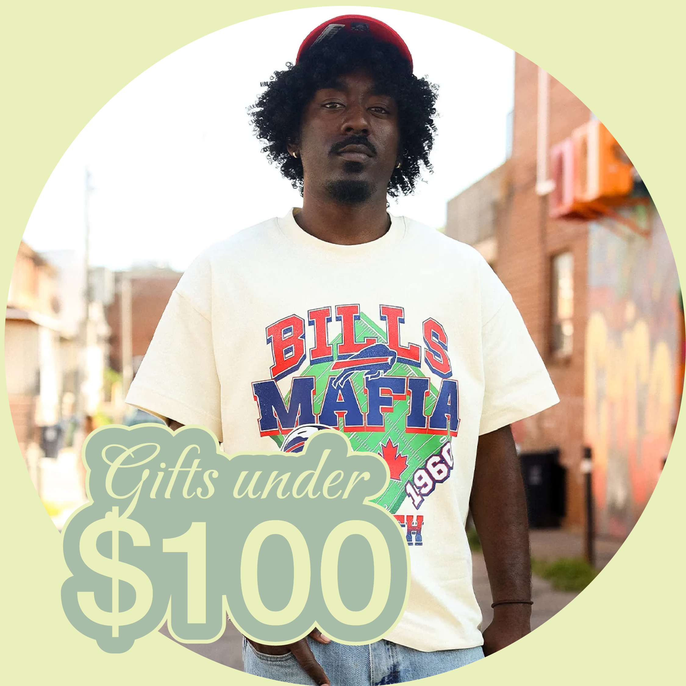 Person wearing a 'BILLS MAFIA' shirt with text 'Gifts under $100.'