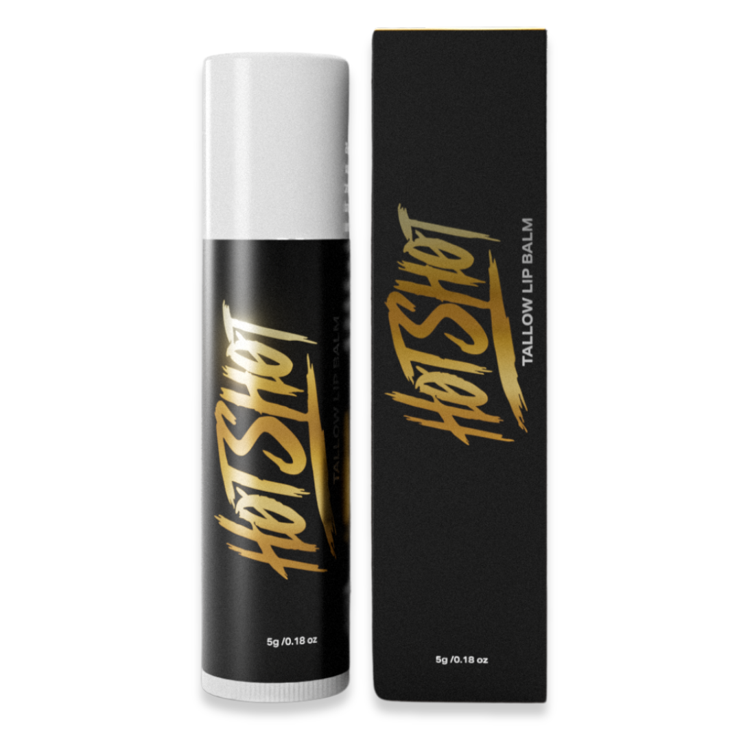 Black and gold lip balm tube and box labeled 'Hot Shot'.