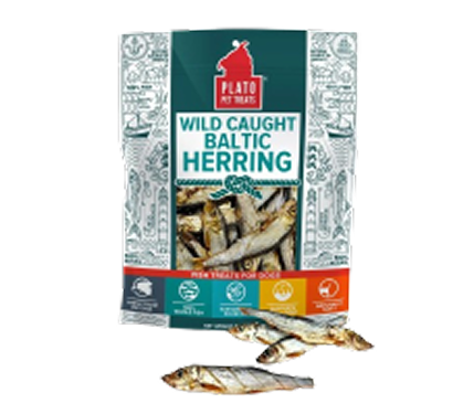 A bag of Plato Pet Treats Wild Caught Baltic Herring with three dried fish in front.