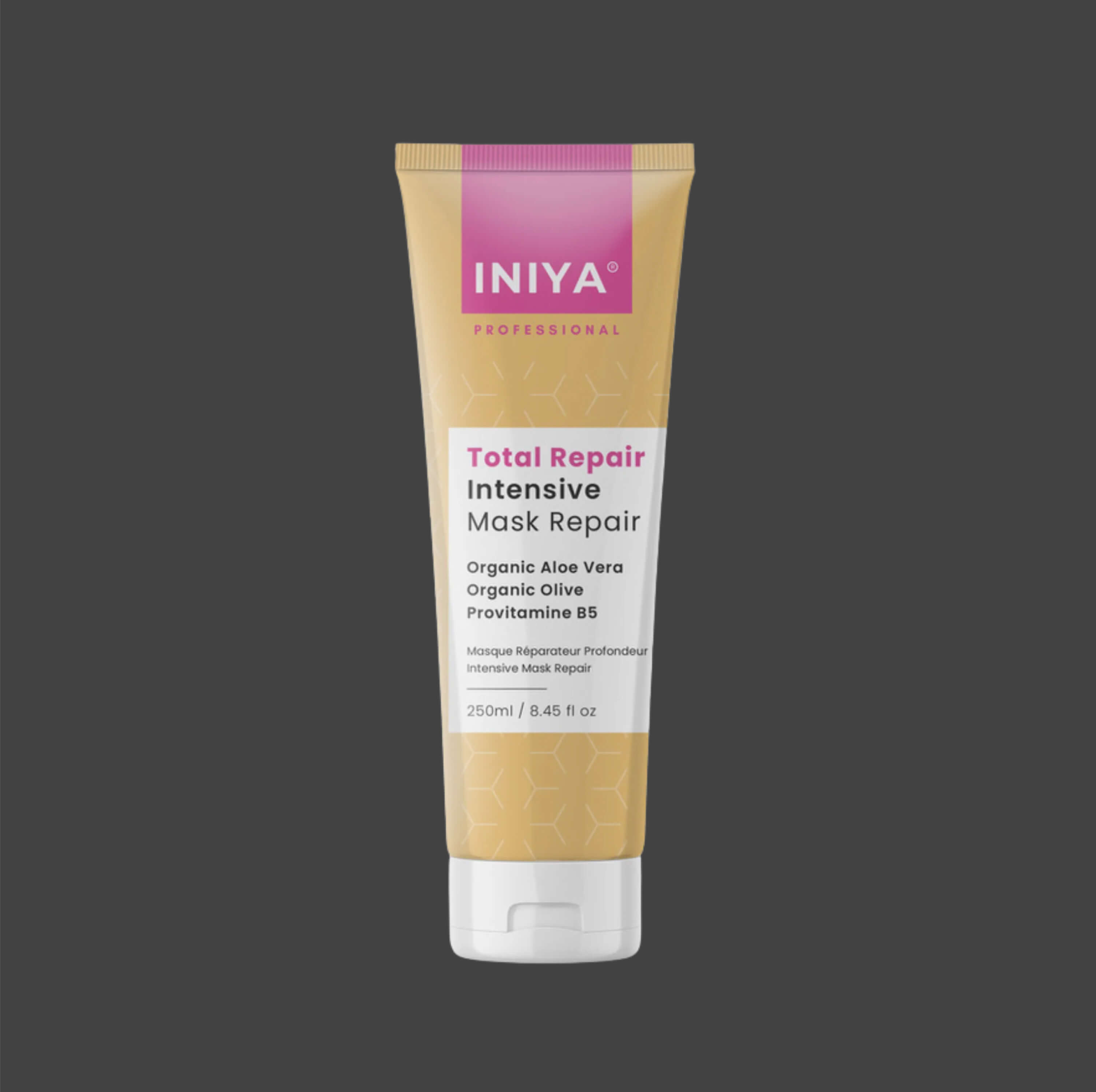 A tube labeled 'Total Repair Intensive Mask Repair' against a dark background.