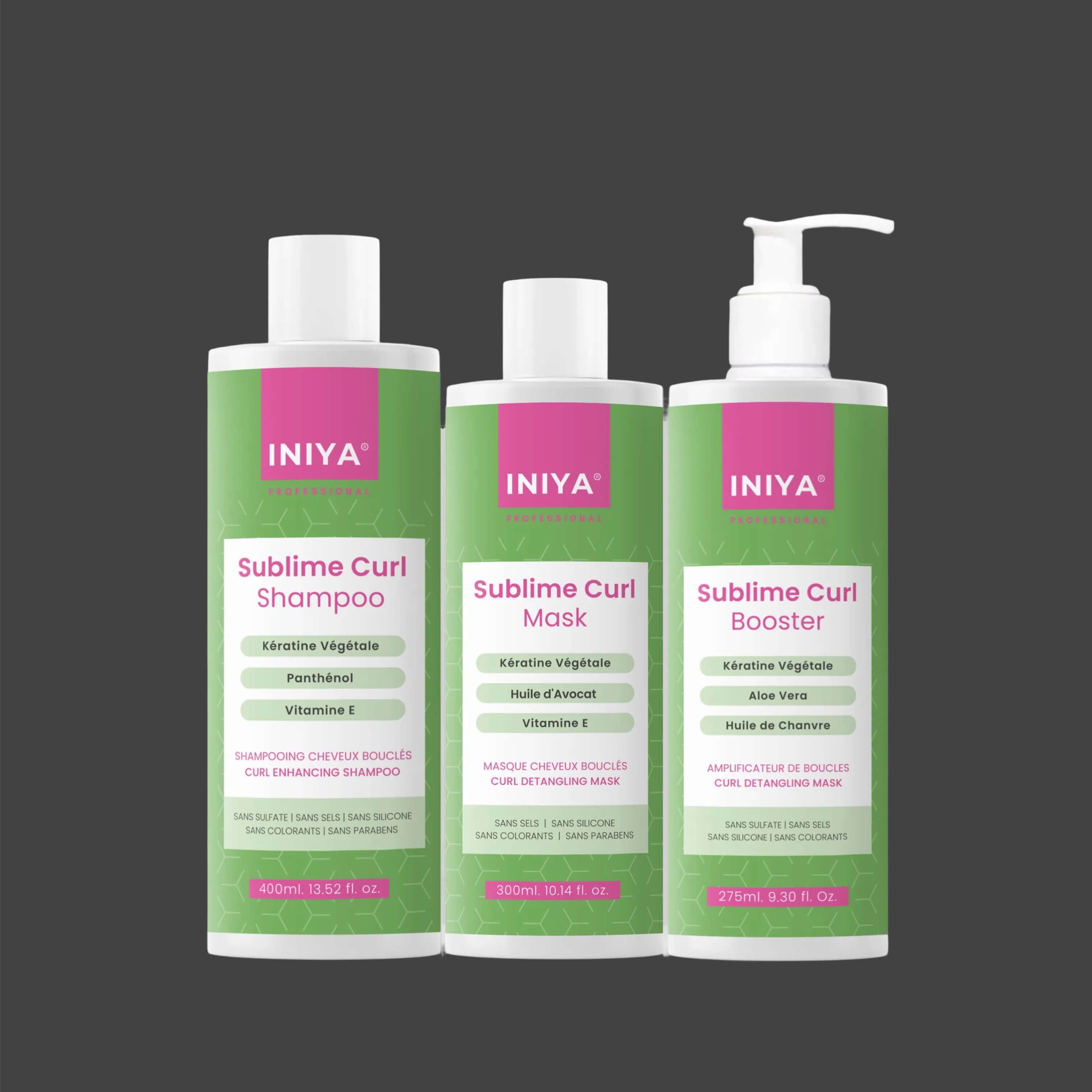 Three hair care products for curls with green and pink packaging.
