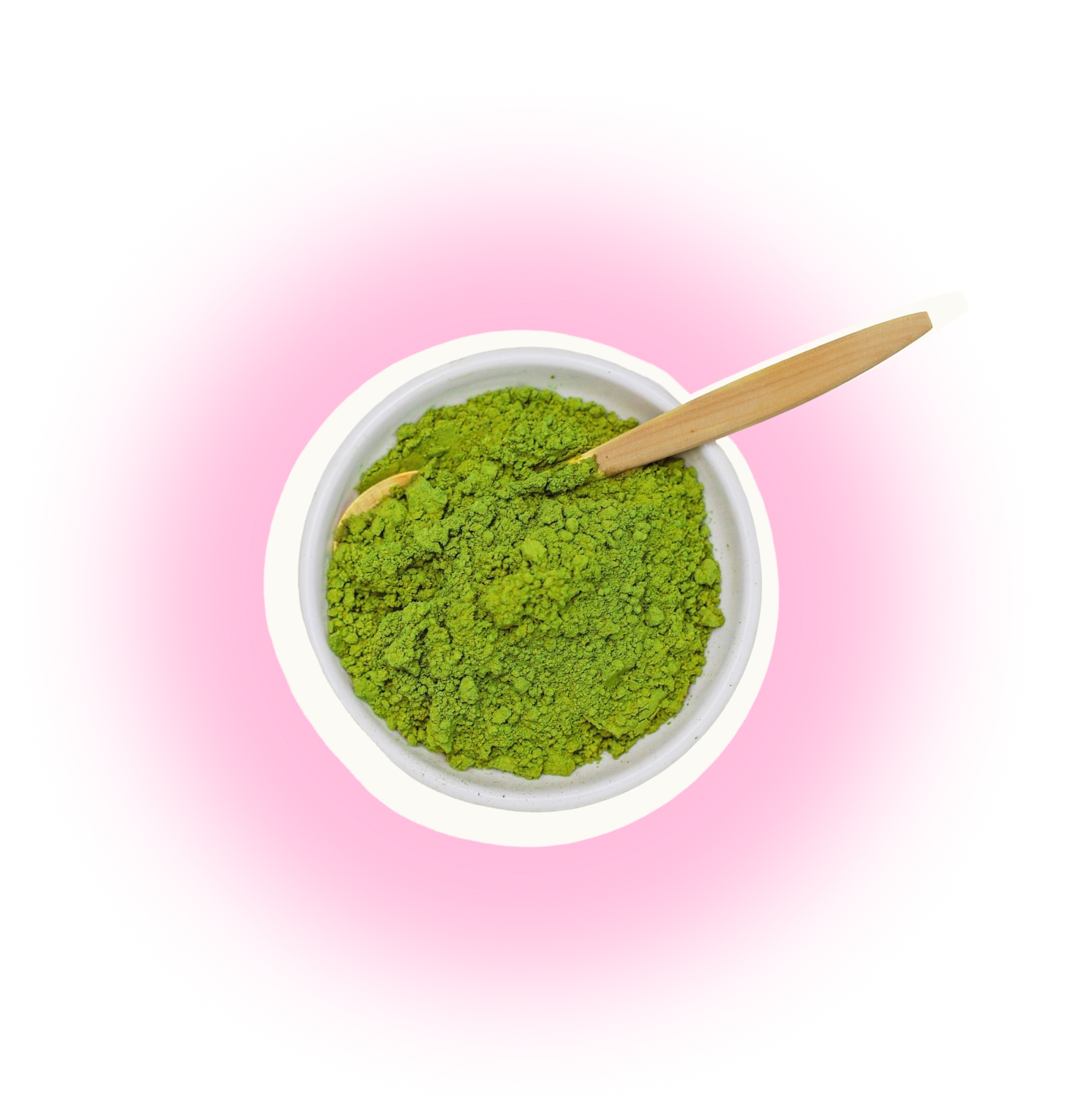 Bowl of green powder with wooden spoon on a pink background.