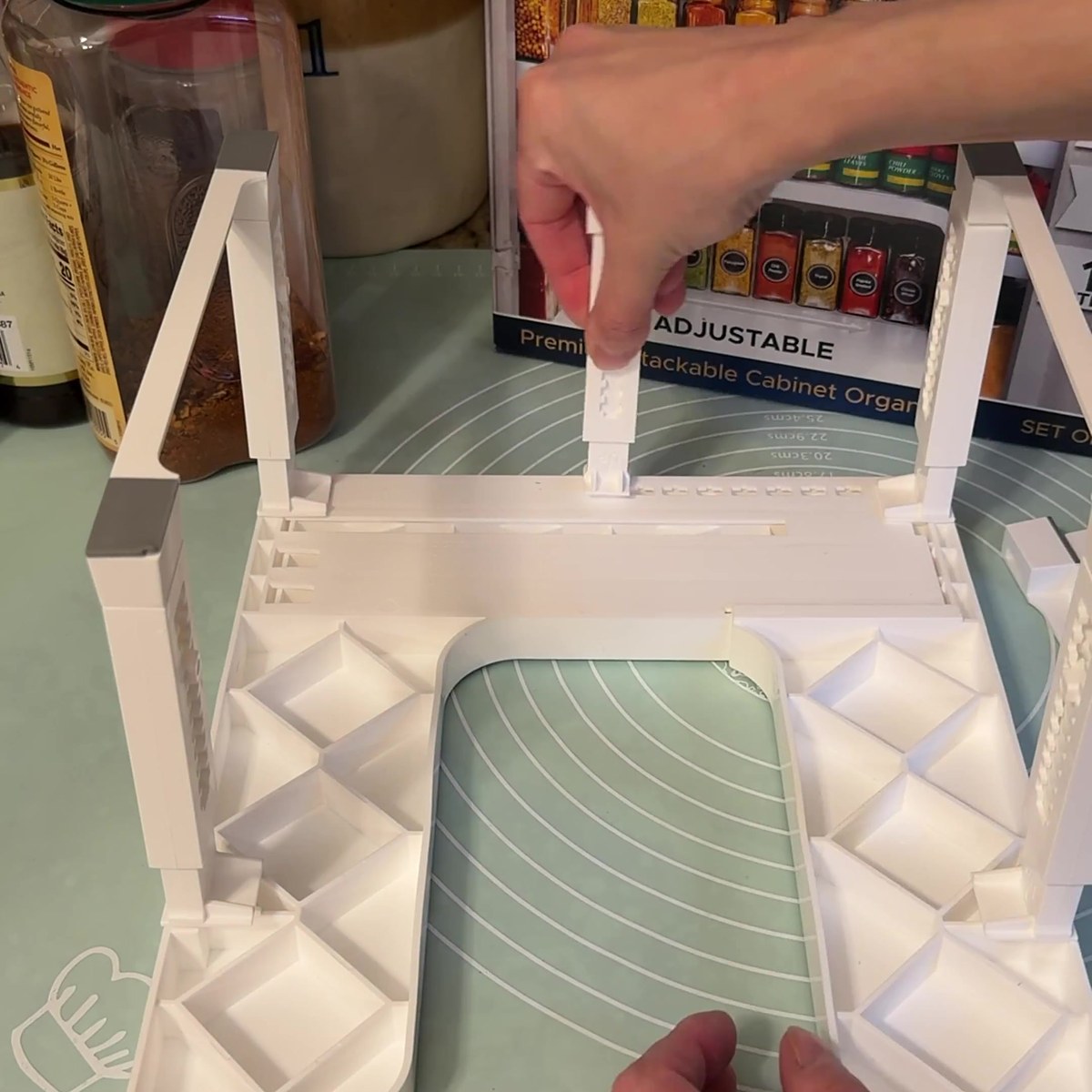 Clicking the legs into a Spicy Shelf Premium shelf