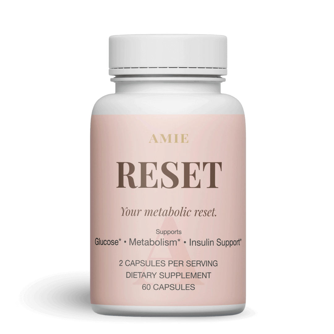 White bottle labeled 'RESET,' dietary supplement for glucose, metabolism, and insulin support.