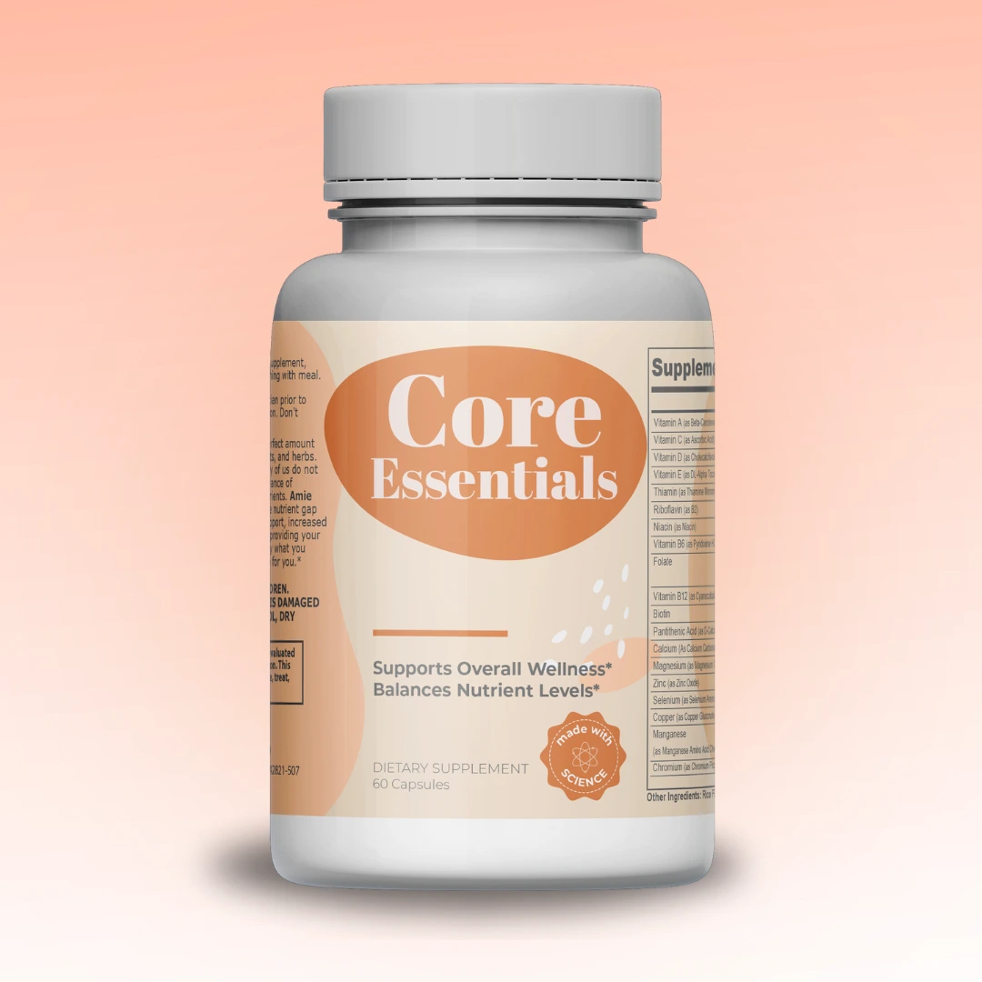 Bottle of Core Essentials dietary supplement on a peach background.
