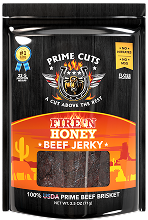 Package of 'Fire 'N Honey Beef Jerky' with a desert-themed design.