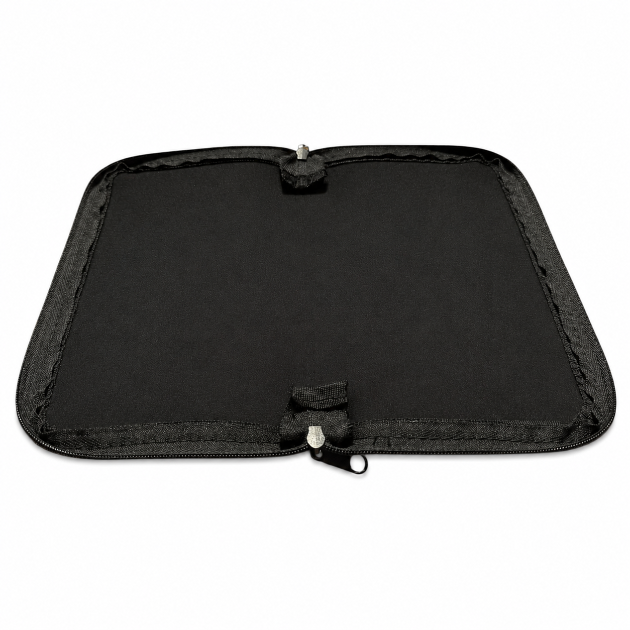 A black zippered case laid open to show its fabric interior against a white background.