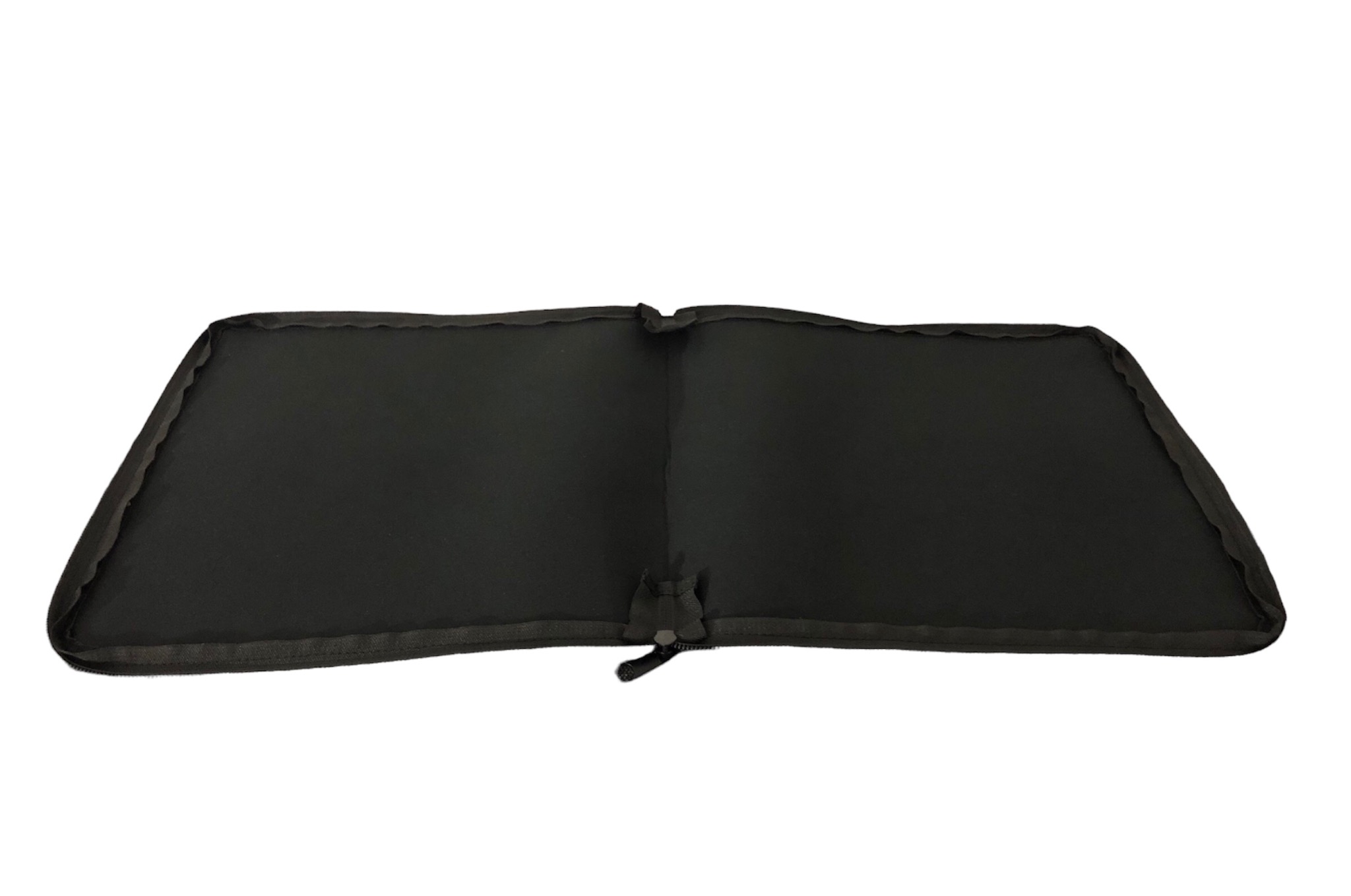 A black zippered case opened and laid flat against a white background.