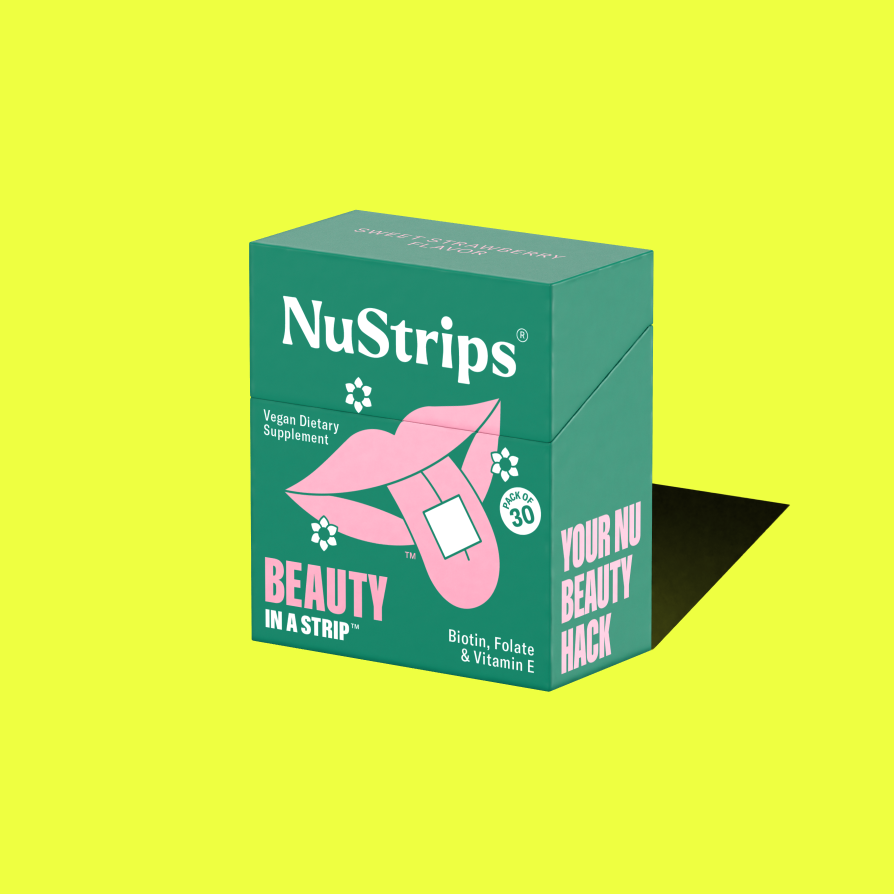 Box of NuStrips beauty dietary supplement on yellow background.