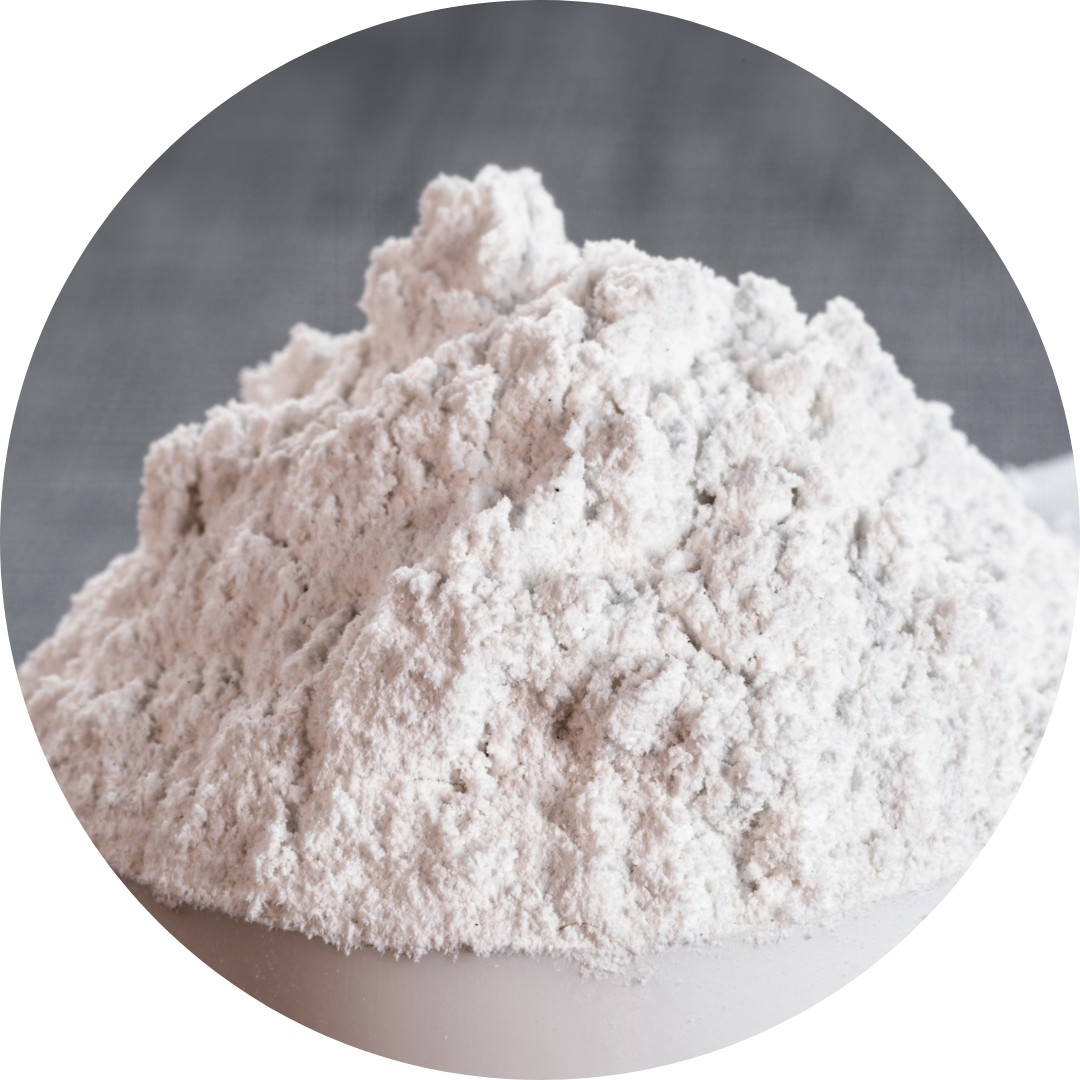 A mound of white powder, resembling flour, in a bowl.