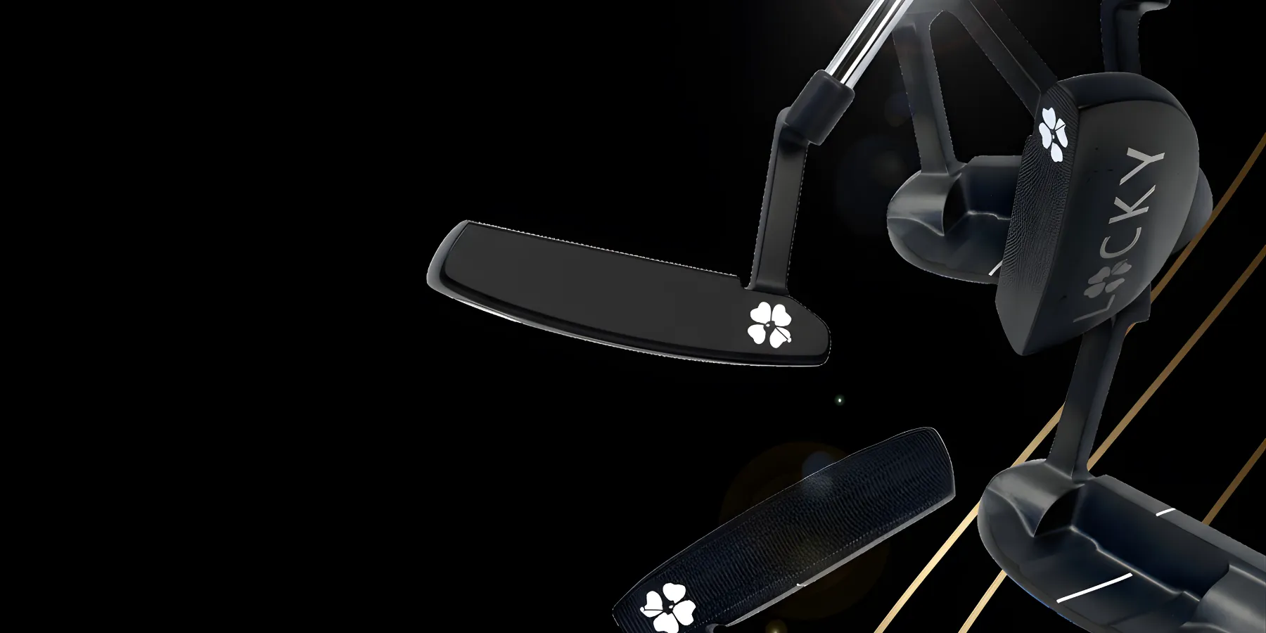 Black golf putters with clover logos on a dark background.