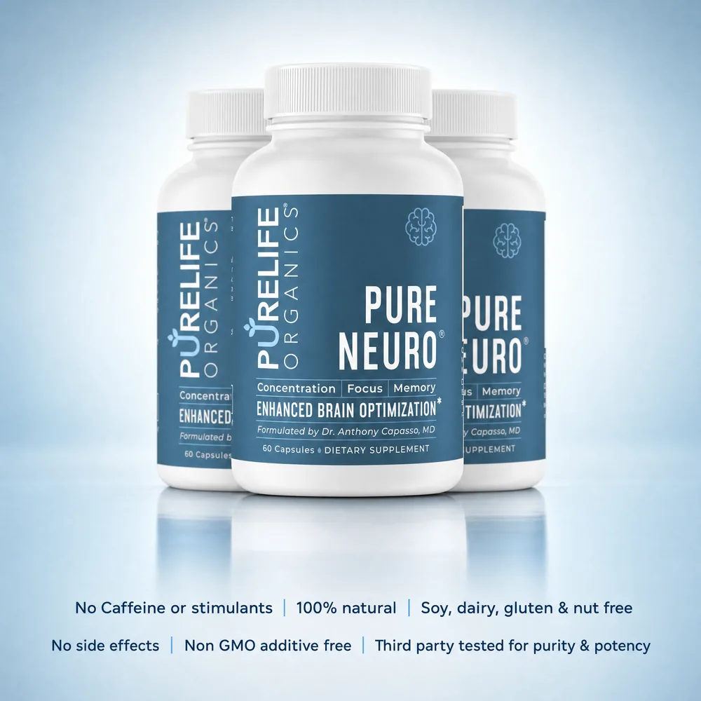 Woman holding a bottle of Pure Neuro supplement in a kitchen.