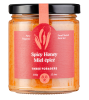 A jar of spicy honey with a red label and black lid.
